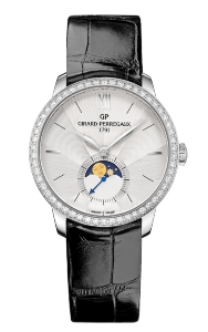 A Girard-Pettegaux watch from the 1996 collection features a vintage-inspired moon phase complication