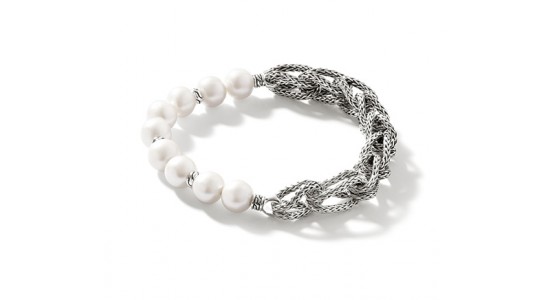 A white gold bracelet that is half chain links and half pearls, available at Swiss Watch Gallery and Fine Jewelry.