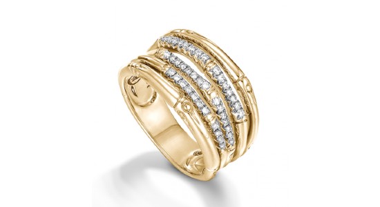 a yellow gold fashion ring with diamonds and bamboo motifs