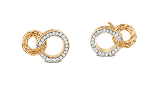 a pair of yellow gold stud earrings with diamond accents