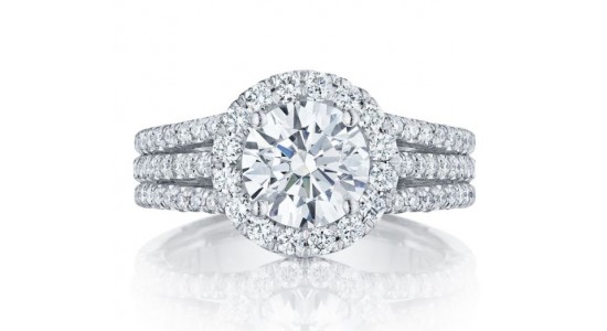 a white gold diamond halo engagement ring by TACORI