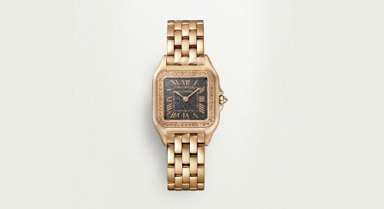 a rose gold metal strap watch with a square case