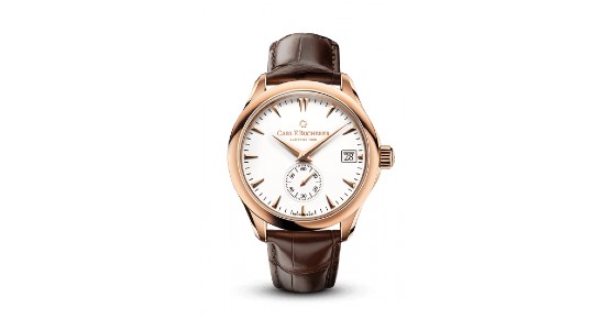 a rose gold watch with a brown leather strap and white dial
